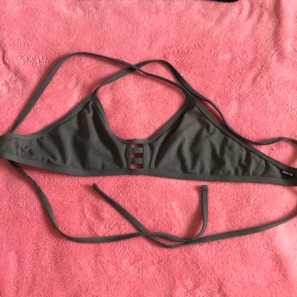 Dark gray swim top.